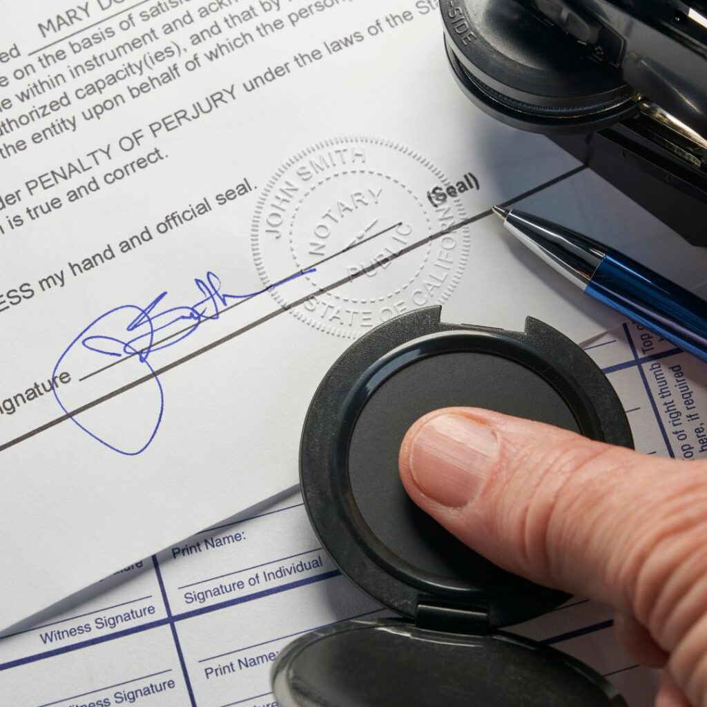 seal being applied to paperwork